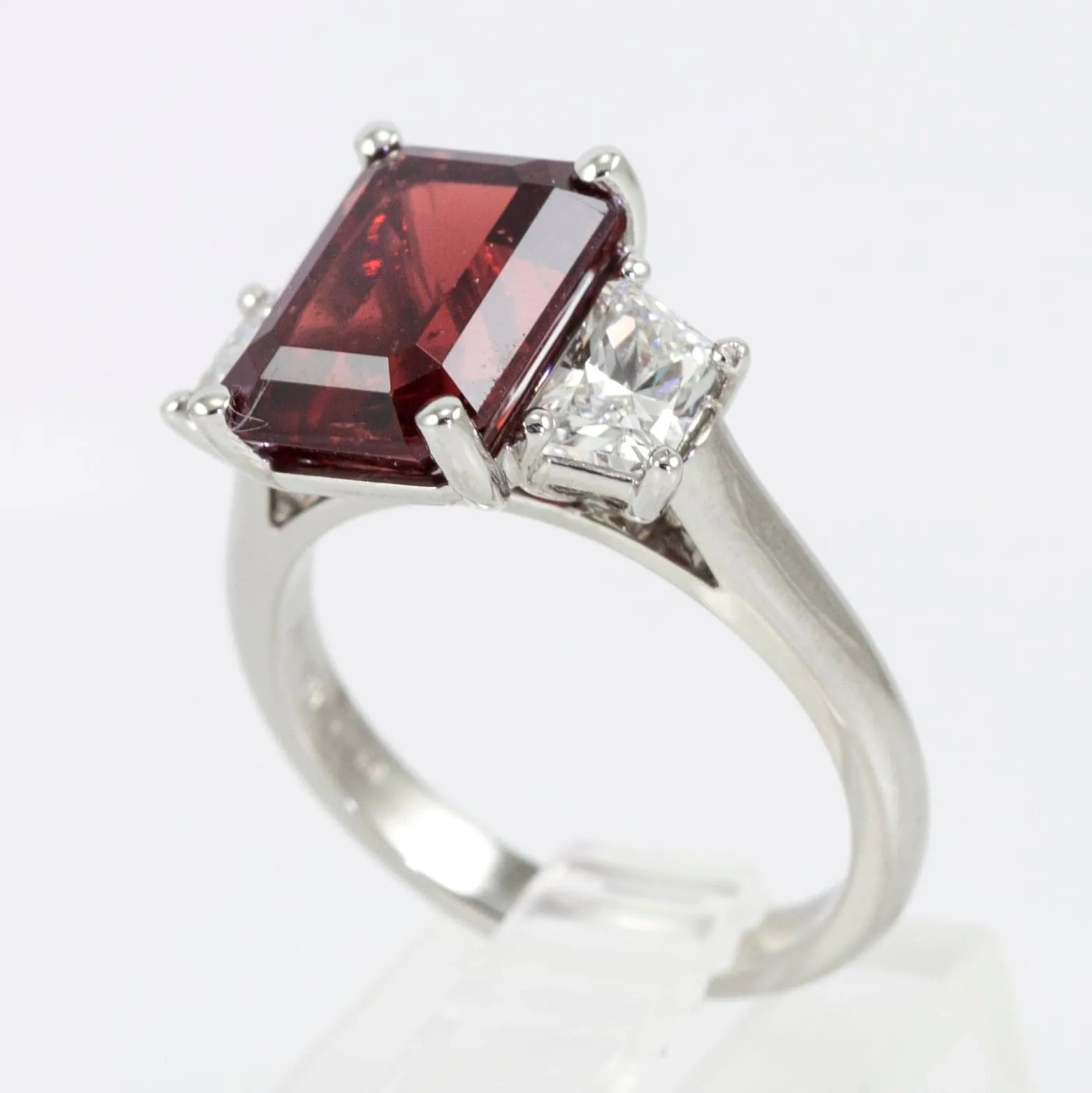 Platinum Red Spinel and Trapezoidal Diamond Three-Stone Ring